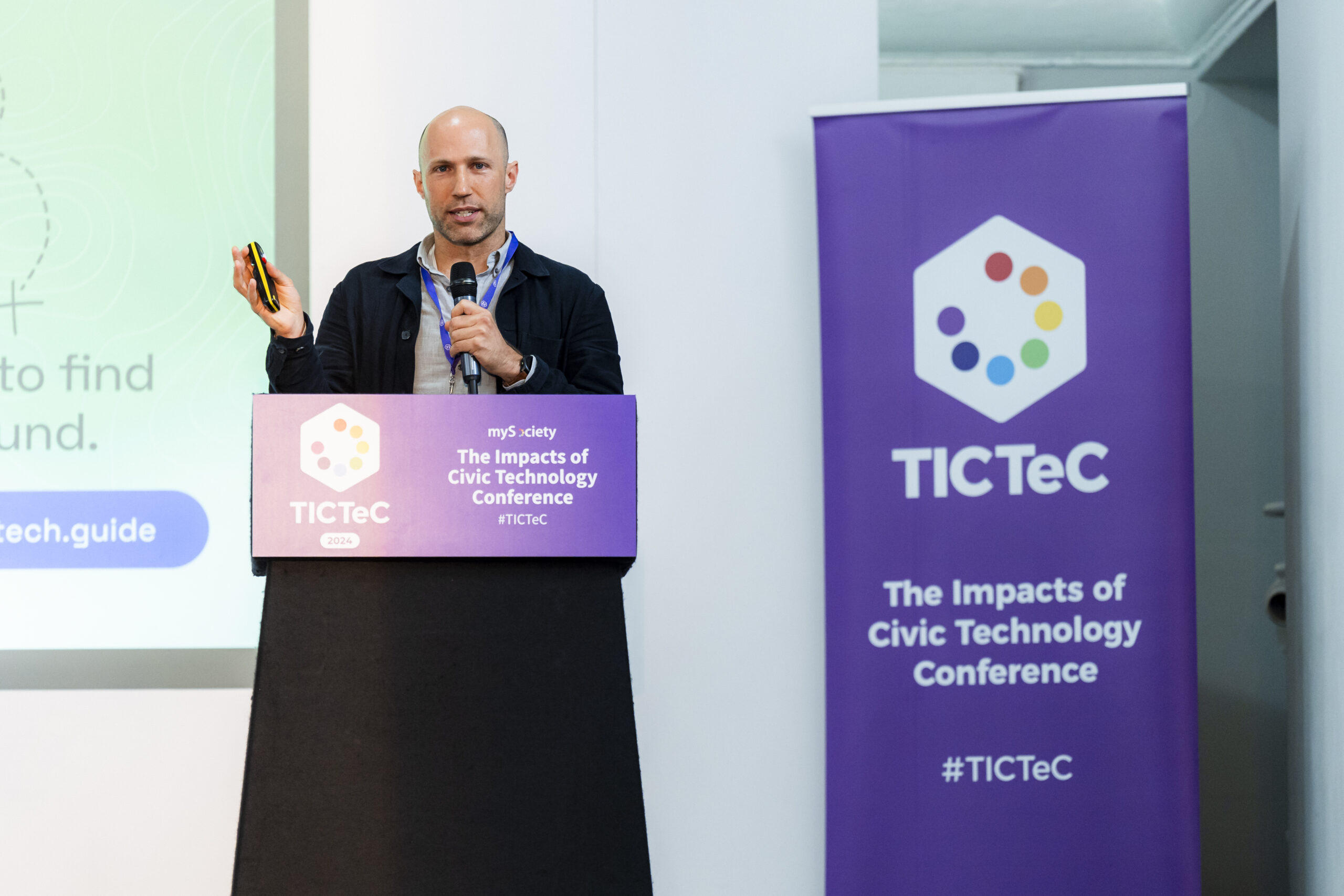 Matt Stempeck presents behind the podium at TICTeC